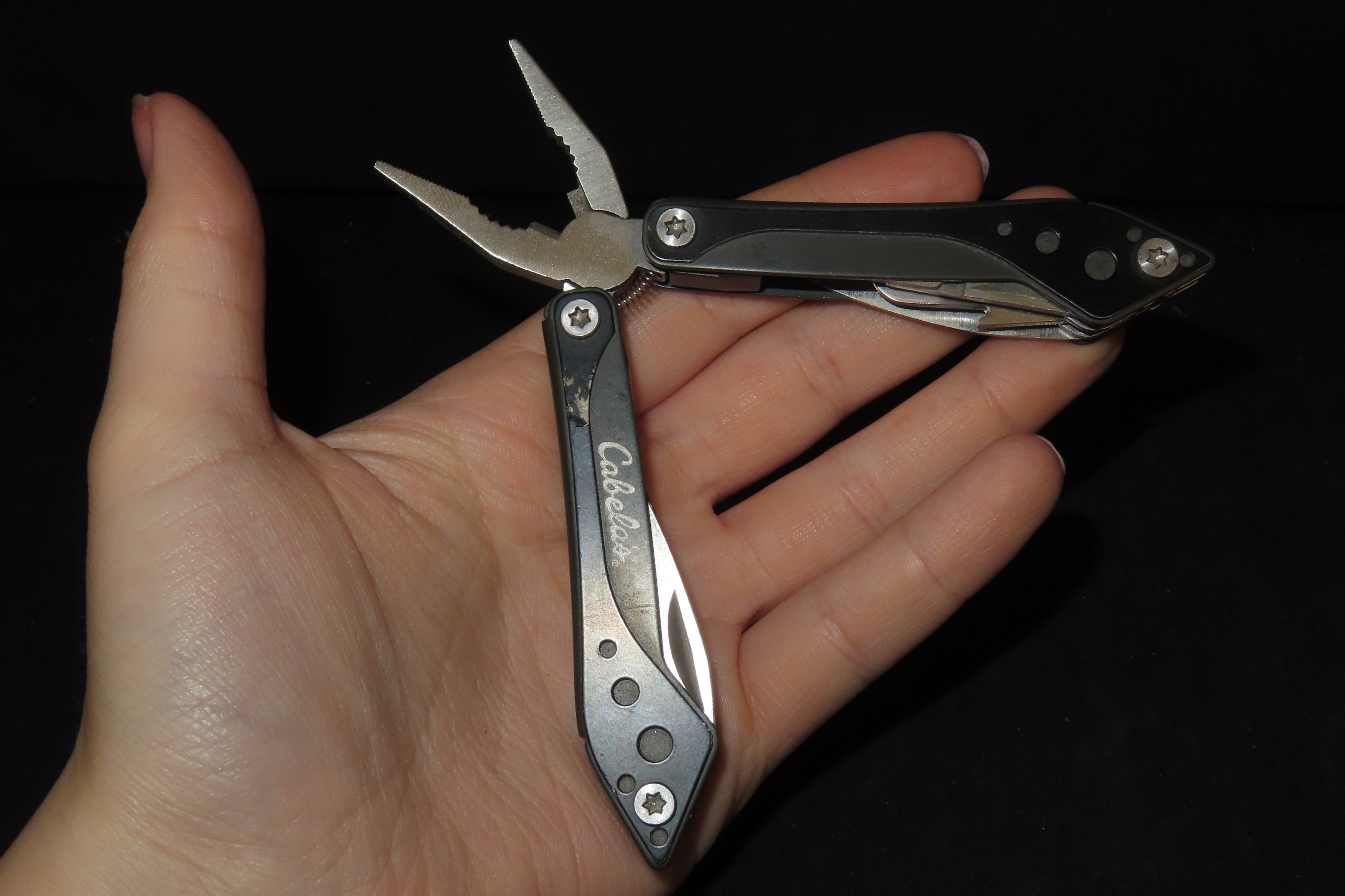 Lot of 5 New Cabela's Brand Pocket Knife Multi Tools, Pliars, Knife, Flat & Phillips Screwdriver, Scissors, Can Opener, Saw. New & Unused. O
