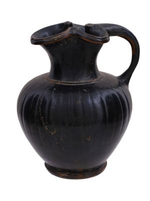 AN ANCIENT GREEK BLACKWARE OINOCHOE, CA. 3RD CENTURY BC. An ancient Greek blackware Oinochoe