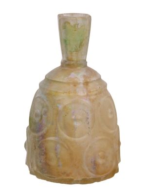 A RARE SASANIAN PERSIAN CUT-GLASS BOTTLE, CA. 3RD-7TH CENT. AD. A beautiful cut-glass bottle