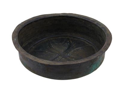A BYZANTINE BREAD MOLD IN BRONZE, CA. 7-10 CEN. AD. A bronze bread mold of circular design