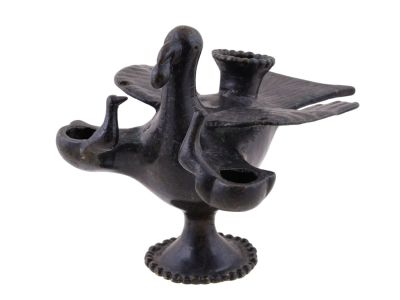 A BRONZE BYZANTINE LAMP WITH TWO BURNERS, CA. 5TH-8TH CENTURY AD. A bronze lamp possibly of