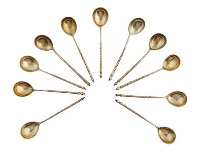 ELEVEN PARCEL-GILT SILVER RUSSIAN TEASPOONS, 1887. A lot of eleven matching Russian gilt-silver 