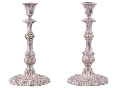 A PAIR OF RUSSIAN SILVER CANDLESTICKS, 19TH CENTURY. A pair of Russian silver candlesticks