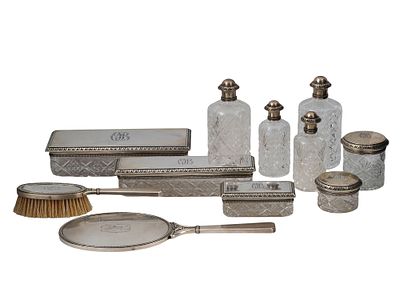 A LOT OF ELEVEN CUT CRYSTAL AND SILVER-MOUNTED TOILET PIECES BY K. FABERGÉ, MOSCOW, EARLY 20TH