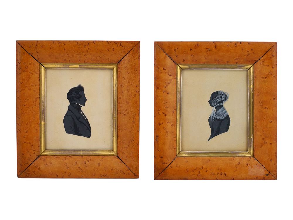 A PAIR OF ENGLISH SILHOUETTES, EARLY 19TH CENTURY. Executed in black ink and heightened with 