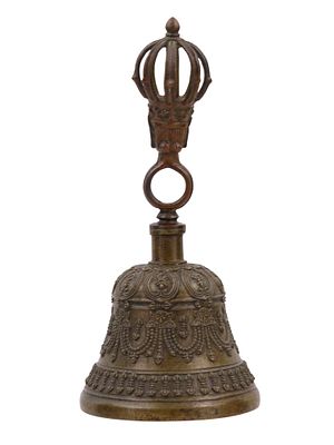 A THAI BUDDHIST BRONZE BELL WITH RELIGIOUS DECORATION. A bronze bell used by the Thai Buddhists 