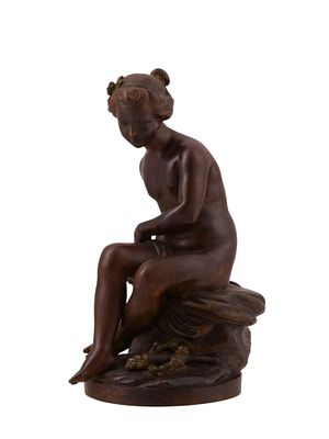 A FRENCH BRONZE NUDE GIRL WITH BOW AFTER A MODEL BY FALCONET, 19TH CEN. A sculpture of a nude 