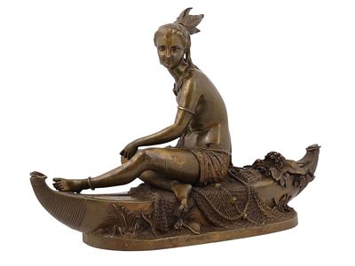 A DUCHOISSELLE FRENCH BRONZE, NATIVE WOMAN IN CANOE. A French bronze figural sculpture of a 