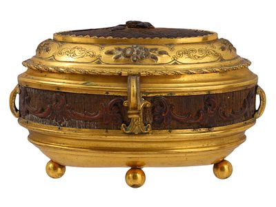 A CONTINENTAL GILT-BRONZE AND WOOD LIDDED BOX, 19TH CENTURY. Of oval form, the hinged cover set 