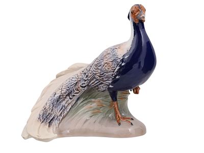A COPENHAGEN PORCELAIN FIGURE OF A PEACOCK, BING & GRONDAHL, DENMARK, 20TH C. Naturalistically 