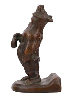 AN ALBERT HUMPHREYS (1864–1922) BRONZE BEAR BOOK END, 1922. A bronze bear figurine by the Ohio 
