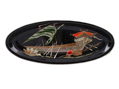 GUY TRÉVOUX (FRENCH, 20TH CENTURY), A QUIMPER PORCELAIN CHINOISERIE PLATE. Of elongated oval 