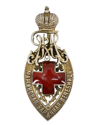 A RUSSIAN BADGE OF THE THIRD ST. PETERSBURG LADIES ' COMMITTEE OF GRAND DUCHESS MARIA PAVLOVNA 