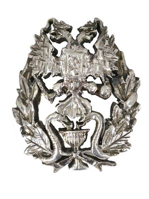 A RUSSIAN IMPERIAL SILVER BADGE. The pin is hallmarked with a Russian silver proof mark. 