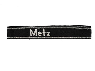 A GERMAN WWII SLEEVE AWARD RIBBON "METZ", WEHRMACHT. Sleeve award ribbon "Metz" (cloth sewing) 