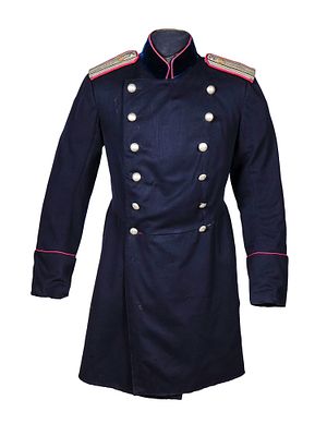 A RUSSIAN IMPERIAL ARMY DARK BLUE FROCK COAT. A Russian Imperial Army dark blue frock coat with 
