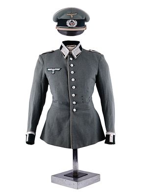 A GERMAN WEHRMACHT ARMY OBERLEUTNANT DRESS TUNIC AND VISOR CAP. A German Wehrmacht Heer (Army) 