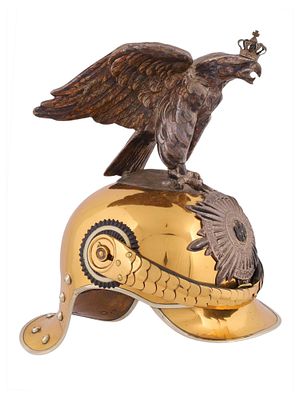 A highly decorative gilt-metal (brass) parade helmet of the Prussian Garde du Corps, featuring 