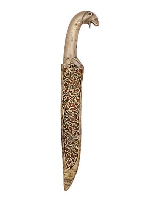 A PERSIAN OR INDO-PERSIAN DAGGER WITH ZOOMORPHIC HILT, 18TH–19TH CENTURY. The steel blade with 
