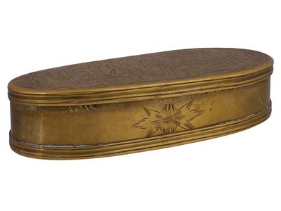 A DUTCH 18TH CENTURY ENGRAVED BRASS BOX. Of elongated oval form, finely engraved to the hinged 
