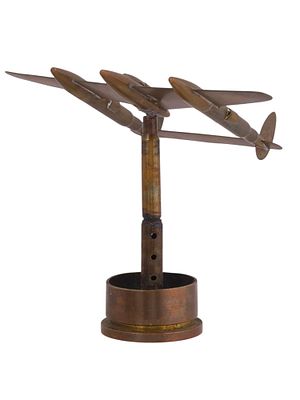 A TRENCH ART MODEL OF A TWIN-ENGINE AIRCRAFT WWII ERA. A hand-crafted model of a twin-engine 