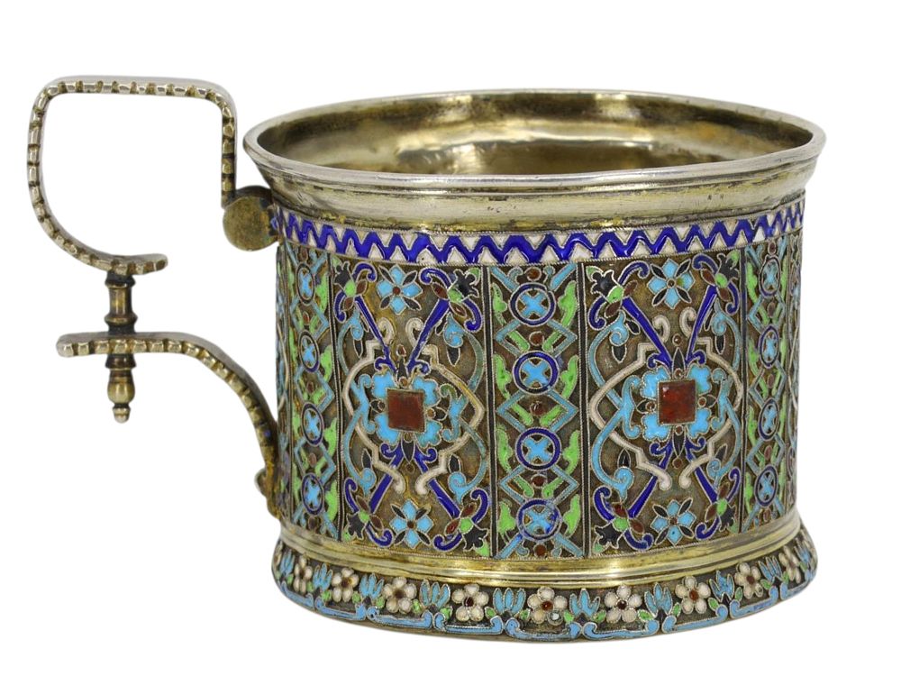 A RUSSIAN KHLEBNIKOV SILVER AND ENAMEL TEAGLASS HOLDER, 1877. Firm of Ivan Khlebnikov, Moscow 