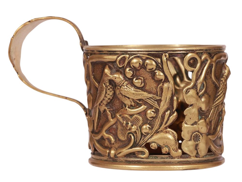 A POLISH BRASS TEA GLASS HOLDER, 19-20 CC. A lot of polish brass tea glass holder of 