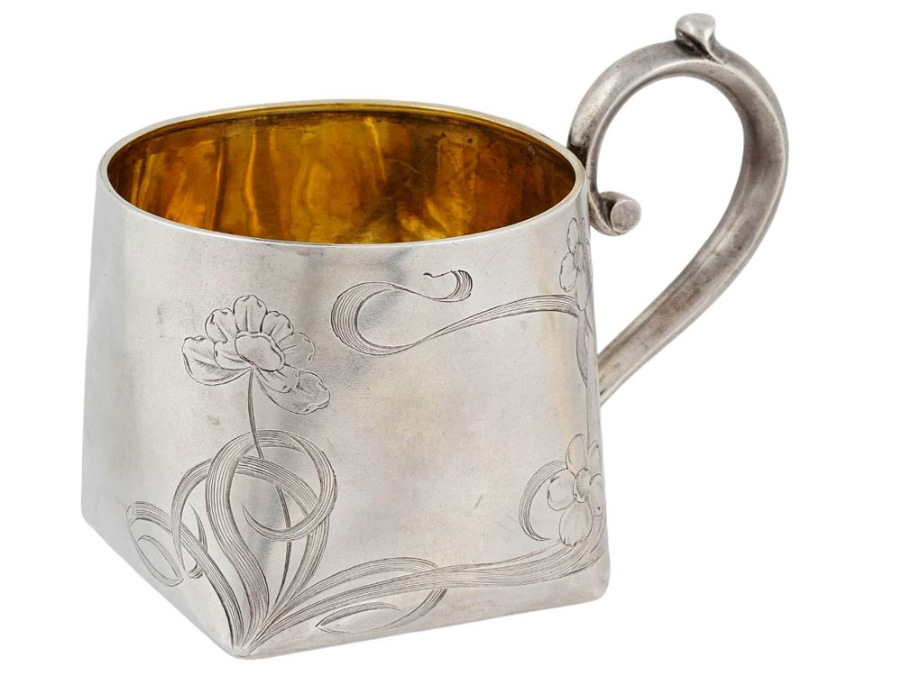A PARCEL-GILT RUSSIAN SILVER TEA GLASS HOLDER, CIRCA 1900. Of square section with softly rounded 