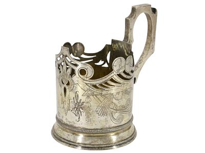 A RUSSIAN SILVER GLASSHOLDER, MOSCOW, CIRCA 1890–1908. Of cylindrical form with an openwork 