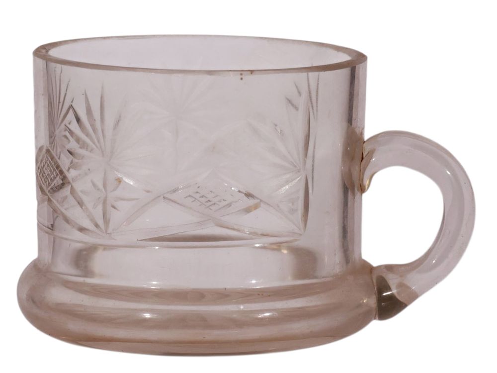 A RUSSIAN STAMPED CUT-GLASS CUP, CA. 1900. Of cylindrical form with a thick rounded base and a 