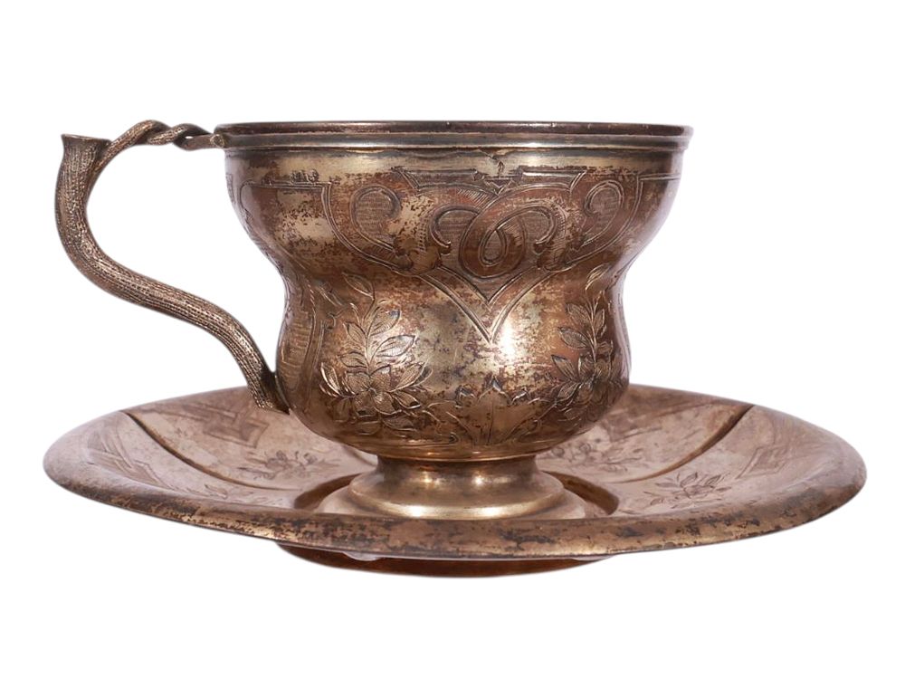 A RUSSIAN GILT-SILVER CHOCOLATE CUP AND SAUCER WITH ENGRAVED PATTERNS, 19TH CEN. A Russian 