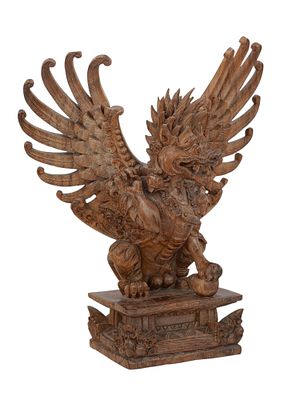 AN INDONESIAN CARVED WOOD MYTHOLOGICAL CREATURE. A highly detailed hand-carved wooden figure of 
