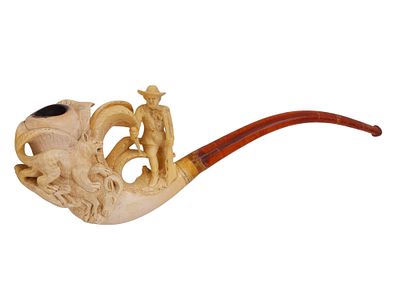 A CARVED MEERSCHAUM HUNTING SCENE TOBACCO PIPE. The large meerschaum bowl finely carved in high 