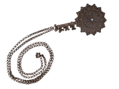 AN OTTOMAN SILVER-MOUNTED HAND MIRROR, 19TH CENTURY. Of circular form, the reverse is richly 