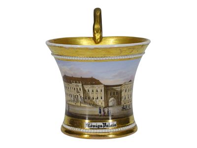 A KPM BERLIN PORCELAIN CUP DEPICTING THE K&Ouml;NIGSPALAIS, PRUSSIA, EARLY 19TH CENTURY. Of flared 
