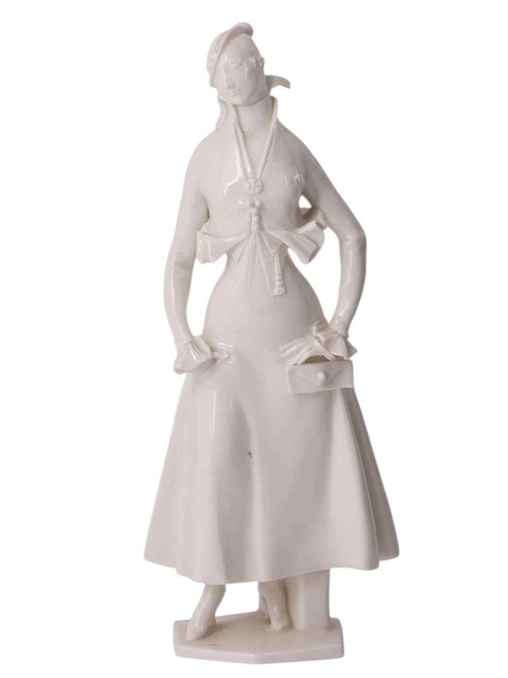 A GERMAN ART DECO WHITE PORCELAIN FIGURE OF A MODERN LADY BY PAUL SCHEURICH, CIRCA 1930. White 