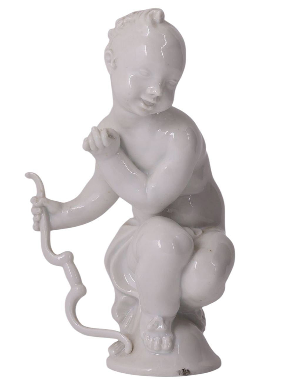 A MEISSEN WHITE PORCELAIN FIGURE OF A PUTTO OR AMOR BY PAUL SCHEURICH, GERMANY, CIRCA 1910-1924. 