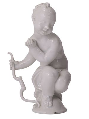 A MEISSEN WHITE PORCELAIN FIGURE OF A PUTTO OR AMOR BY PAUL SCHEURICH, GERMANY, CIRCA 1910-1924. 