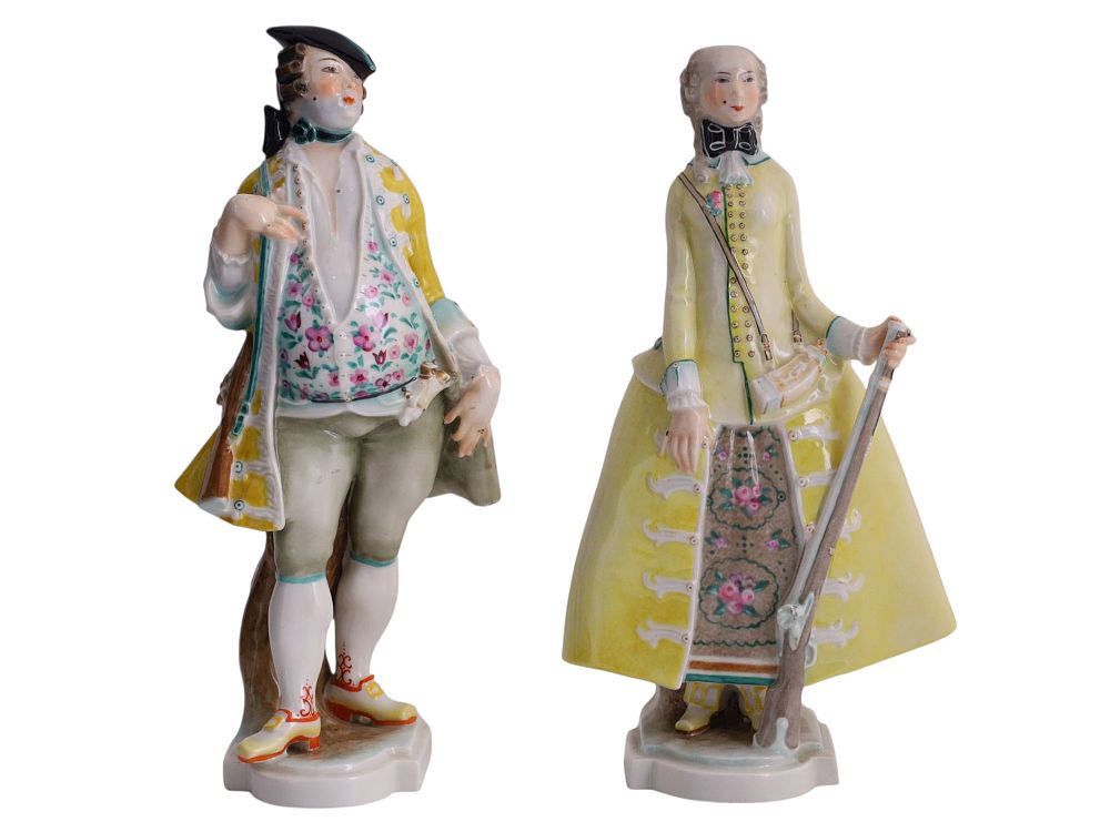 A PAIR OF GERMAN PORCELAIN FIGURES REPRESENTING AN 18TH-CENTURY HUNTER AND COMPANION 