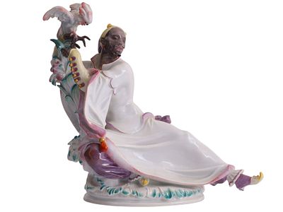 A MEISSEN PORCELAIN FIGURE "MOHR MIT KAKADU", MODELED BY PAUL SCHEURICH, GERMANY, FIRST HALF 