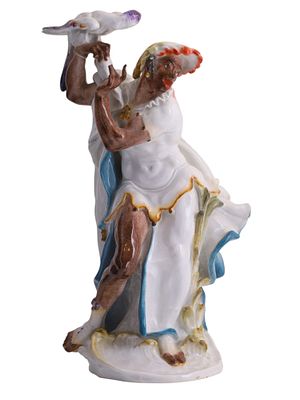 A MEISSEN PORCELAIN FIGURE "A BLACKAMOOR DANCER WITH A PARROT", MODELED BY PAUL SCHEURICH 