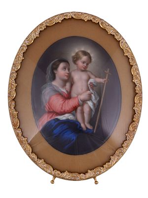 A CONTINENTAL PORCELAIN PLAQUE DEPICTING THE MADONNA AND CHILD, MID 19TH CENTURY. An oval 