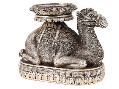 A EUROPEAN, 20TH CENTURY SILVERED METAL FIGURAL CAMEL STAND. Modeled as a recumbent camel 