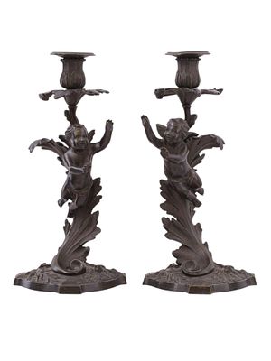 A PAIR OF 19TH CENTURY DARK PATINATED BRONZE FIGURAL CANDLES. Each cast in dark patinated bronze 