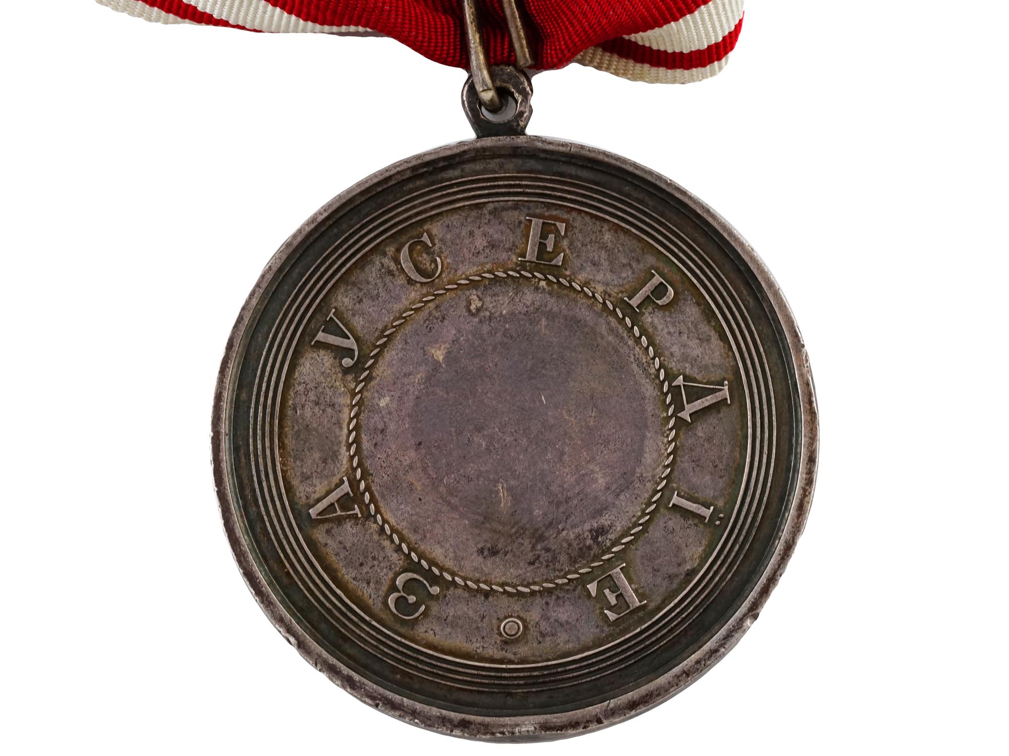 A RUSSIAN NECK SILVER MEDAL FOR ZEAL WITH RIBBON, ALEXANDER III
