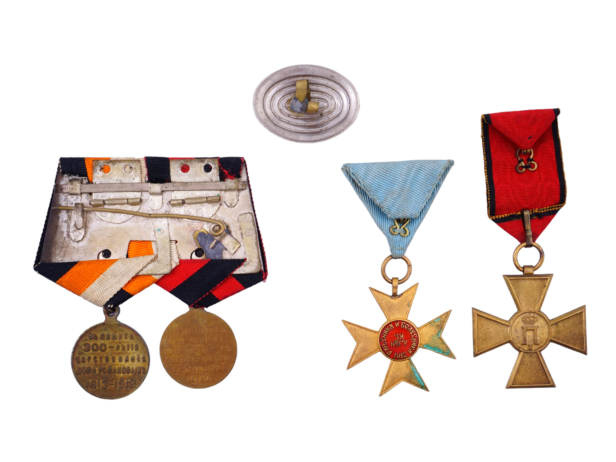 FOUR IMPERIAL RUSSIAN DECORATIONS AND A COCARDE, CA. 1914