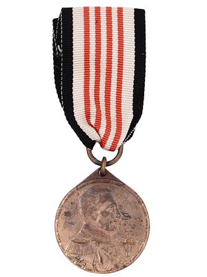 A GERMAN COLONIAL SERVICE MEDAL, 1912. A German Colonial Service medal awarded to those who 