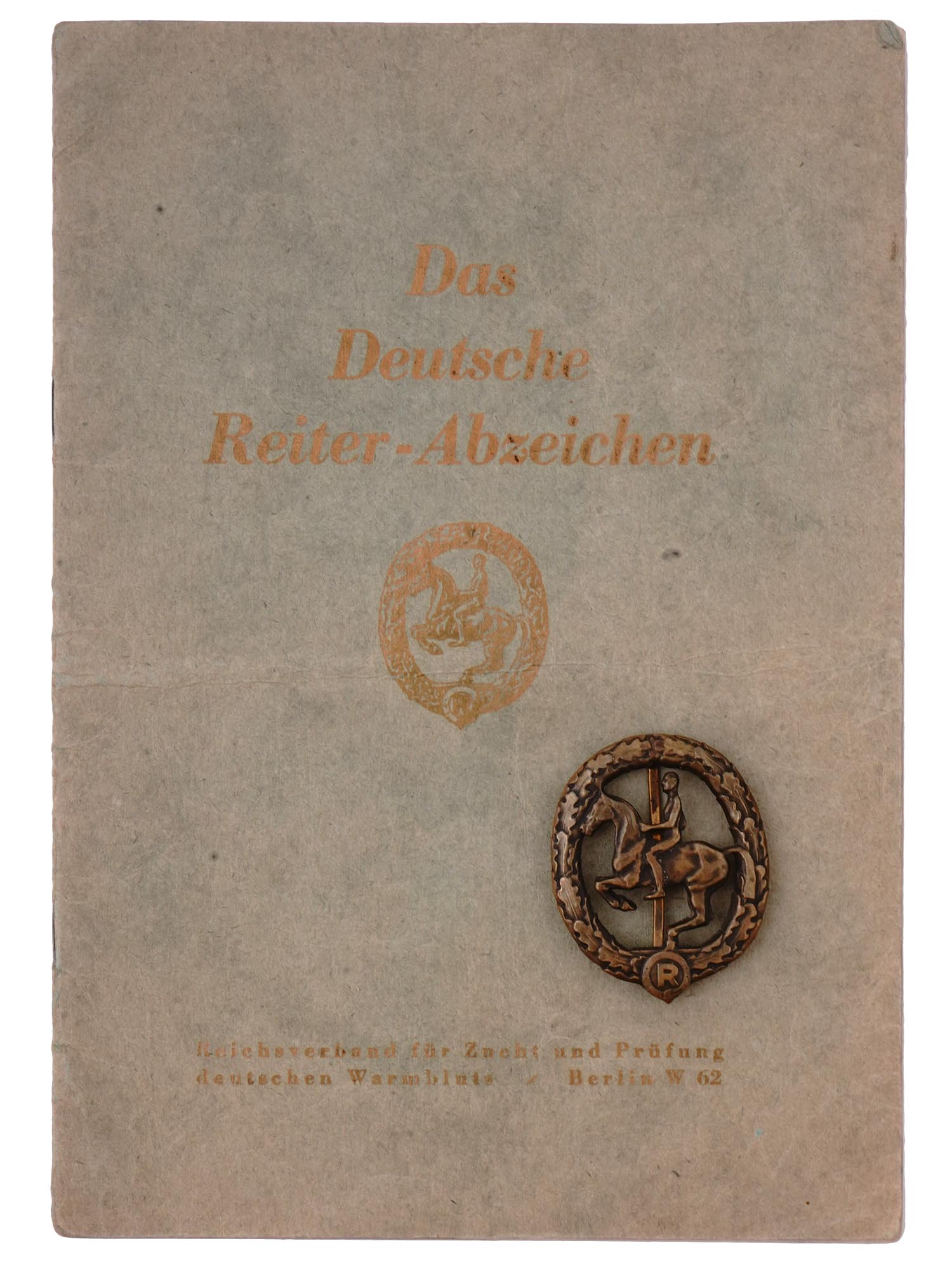 A GERMAN EQUESTRIAN BADGE IN BRONZE WITH CERTIFICATE