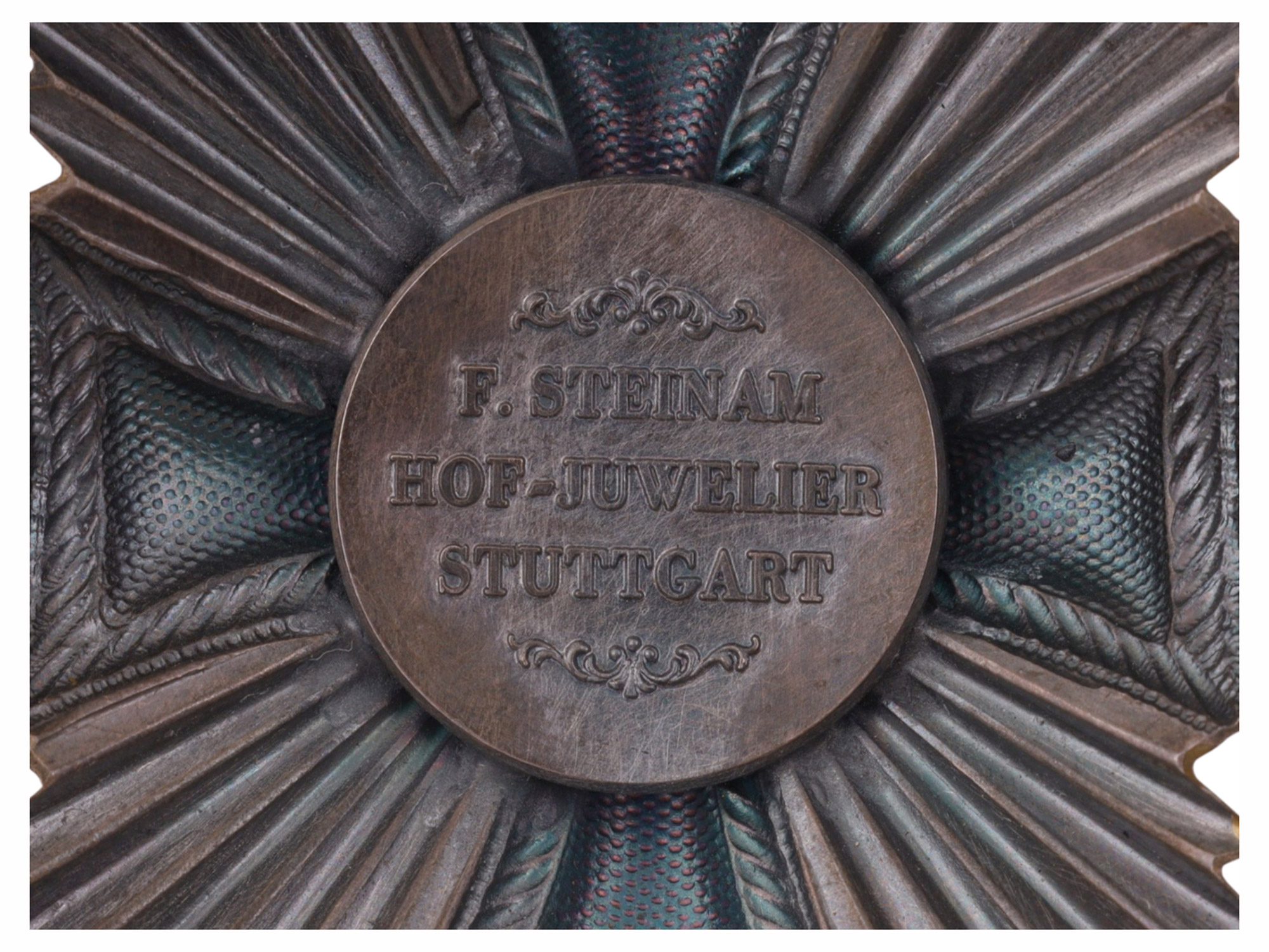A KNIGHT'S CROSS BREAST STAR OF THE WÜRTTEMBERG ORDER OF FREDERICK (FRIEDRICHS-ORDEN), WITH SWORDS, BY F. STEINAM