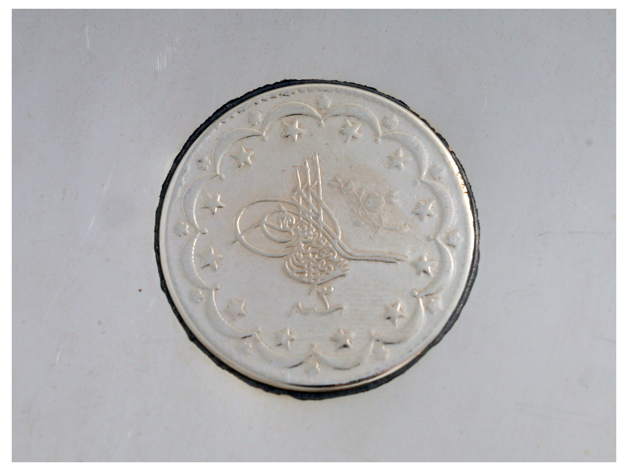 A PAIR OF TURKISH SILVER PLATES WITH COINS AND TUGHRA MARKS